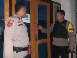 Personel Polres Bima Kota Laksanakan Pengamanan Logistik Pemilukada 2024 di PPK Kecamatan