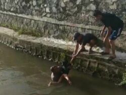 Bripka Dahlan Selamatkan Nyawa Bocah dari Maut Sungai Cipayung