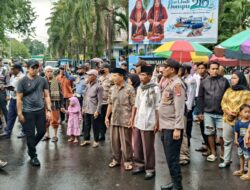 Di Tengah Hujan Deras, Polsek Dompu Amankan Keberangkatan Jamaah Haji Kloter 12 dengan Penuh Haru