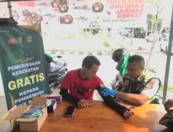 Si Dokkes Polres Bima Kota Gelar Pemeriksaan Kesehatan Gratis dan Bagikan Vitamin untuk Pengemudi Ojek Online